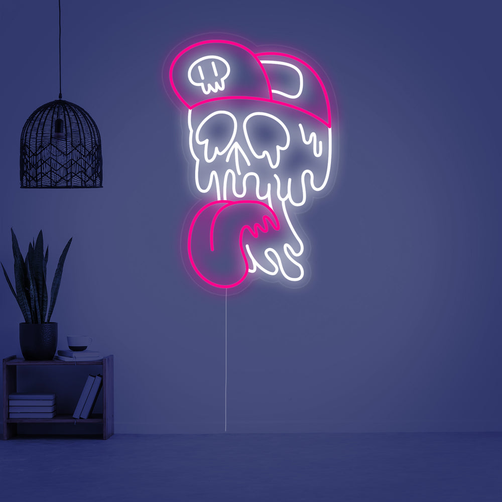A close-up view of the 'Skull Melting' neon sign shows the detailed glowing outlines in blue and purple on a transparent acrylic backing.