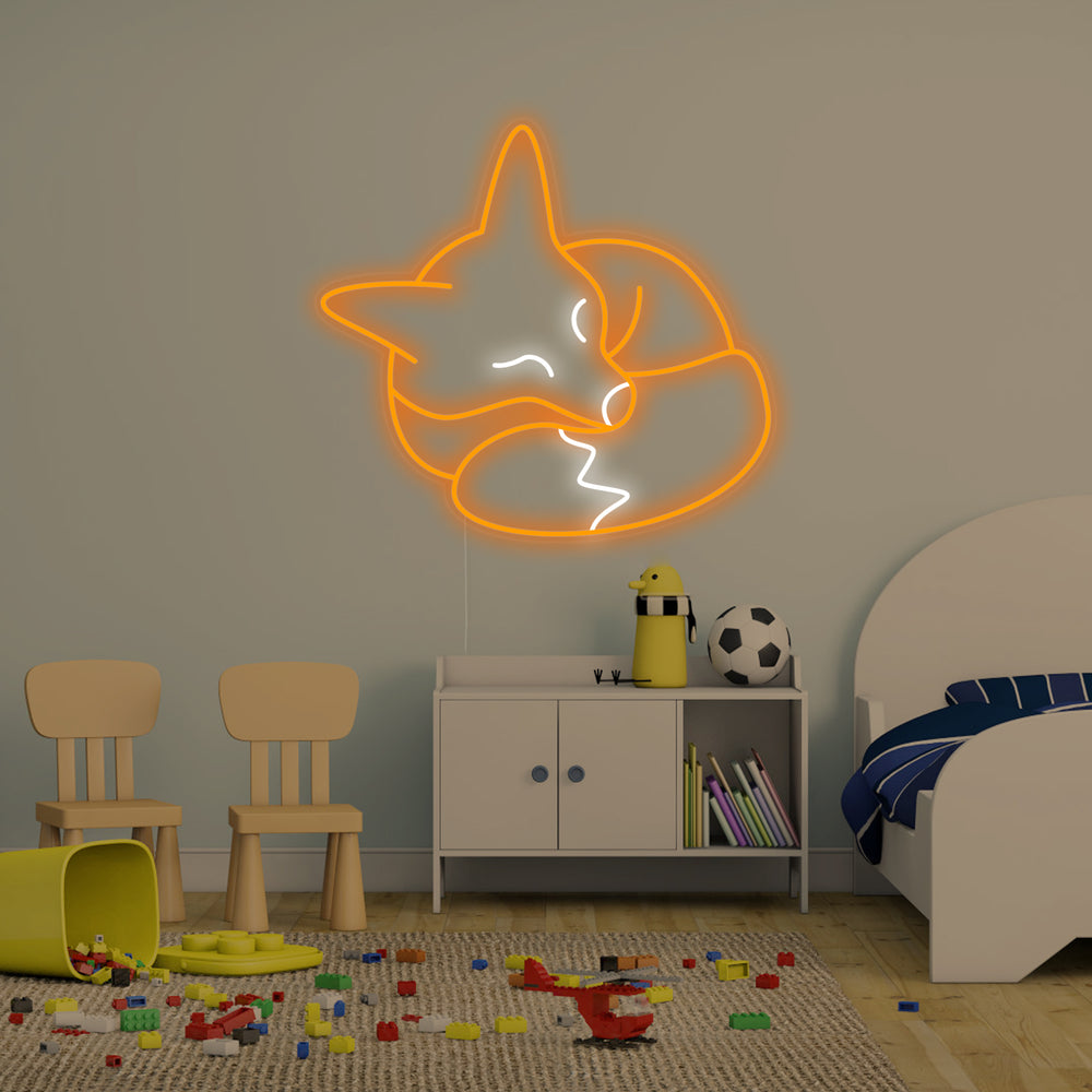 The sleeping fox neon sign glowing warmly, casting a soft light in a styled kids' room.