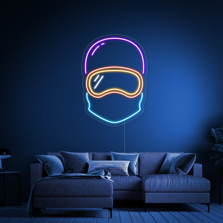 Closer view of the snowboarding snowman neon sign glowing in blue and white, displayed indoors.