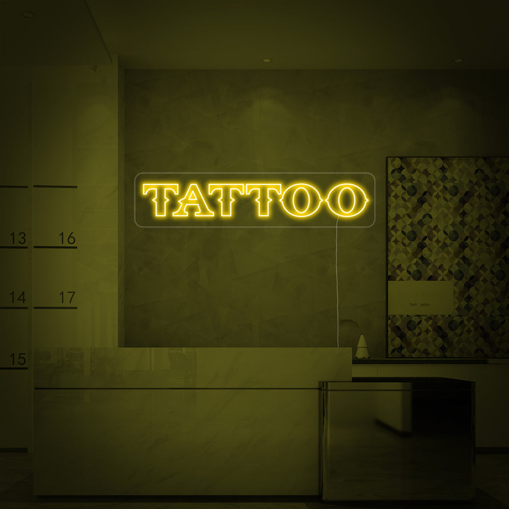 Tattoo studio neon sign with clear lettering