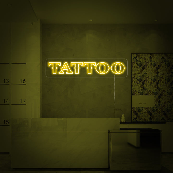 Tattoo studio neon sign with clear lettering