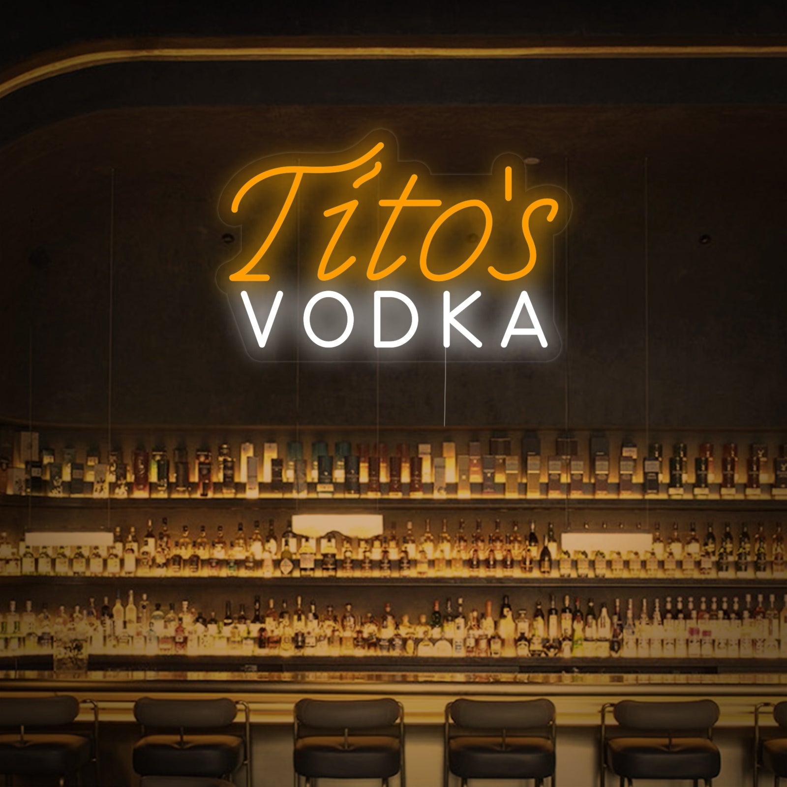 Close-up detail of the Titos VODKA neon sign branding