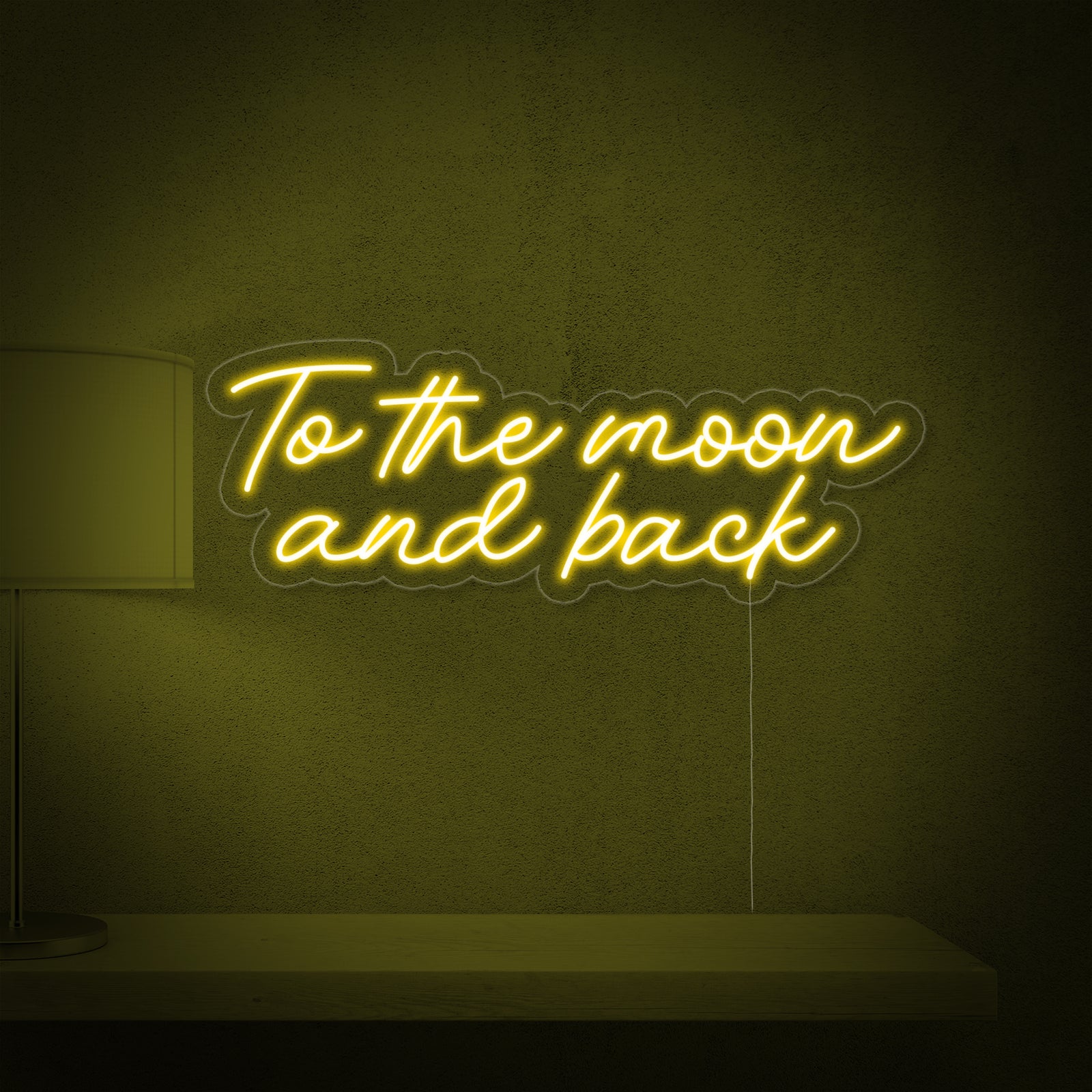 Close-up of the To The Moon and Back neon sign showing the light tubes and acrylic backing