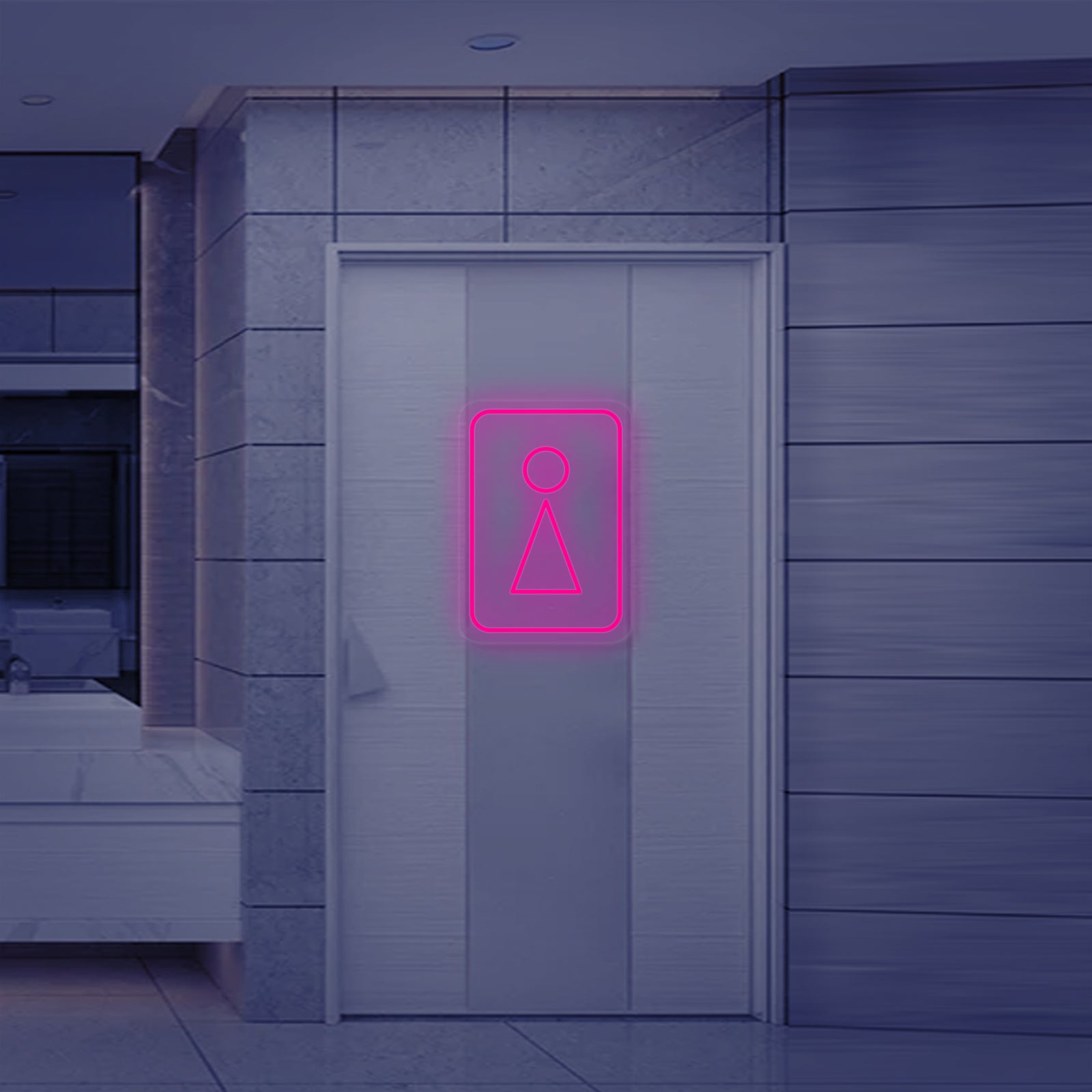 A close-up view of the 'Toilet WC Woman Symbol' neon sign, showing the detail of the luminous tubing and the classic female pictogram design.