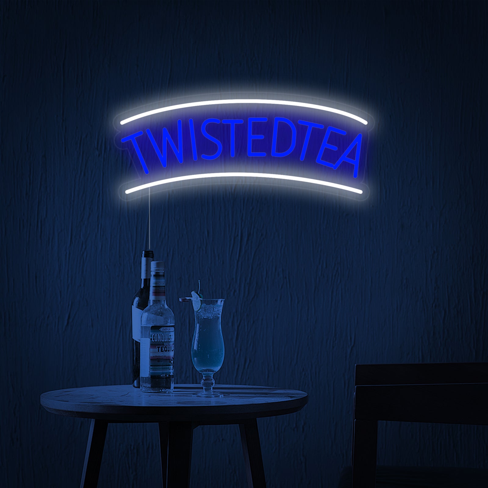 A detailed product shot of the "Twisted Tea" logo rendered as a luminous neon sign.