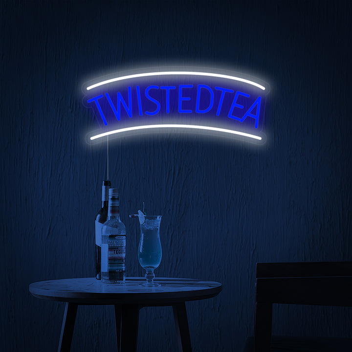 A detailed product shot of the "Twisted Tea" logo rendered as a luminous neon sign.