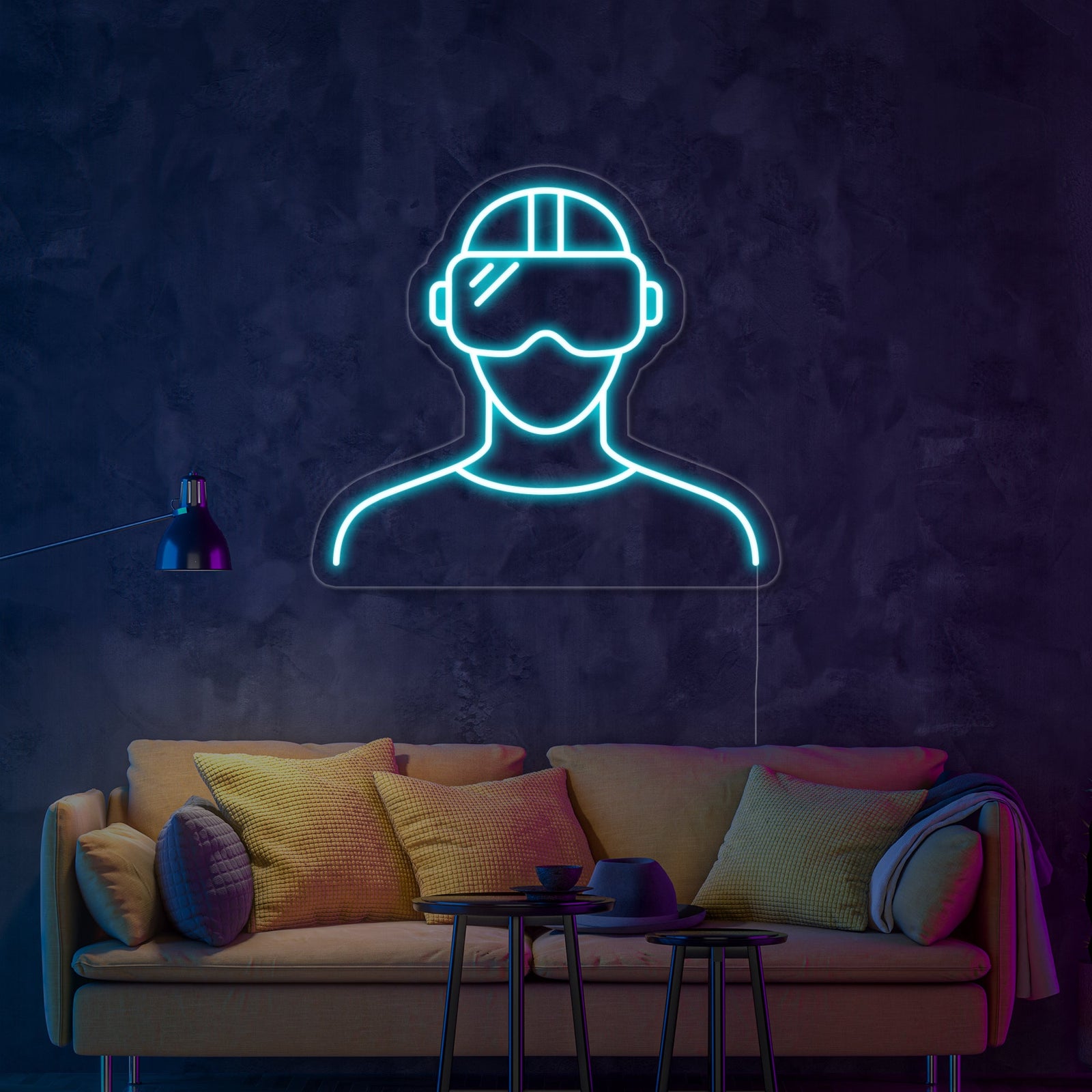 A glowing VR headset neon sign, predominantly bright blue and white, mounted on a rustic wood plank wall above a gaming desk area.