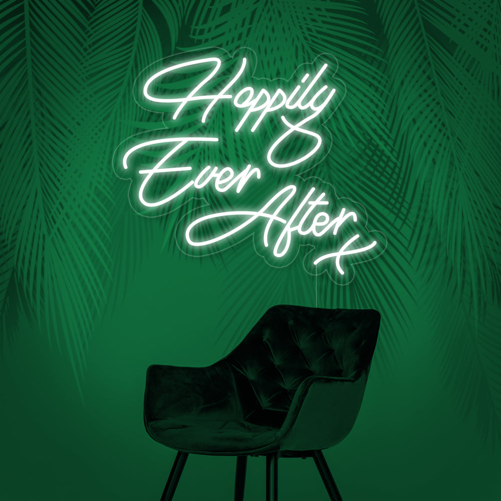 A centered photo of the "Happy Ever After" neon sign, illuminated and mounted against a neutral wall, highlighting its script design and realistic construction.