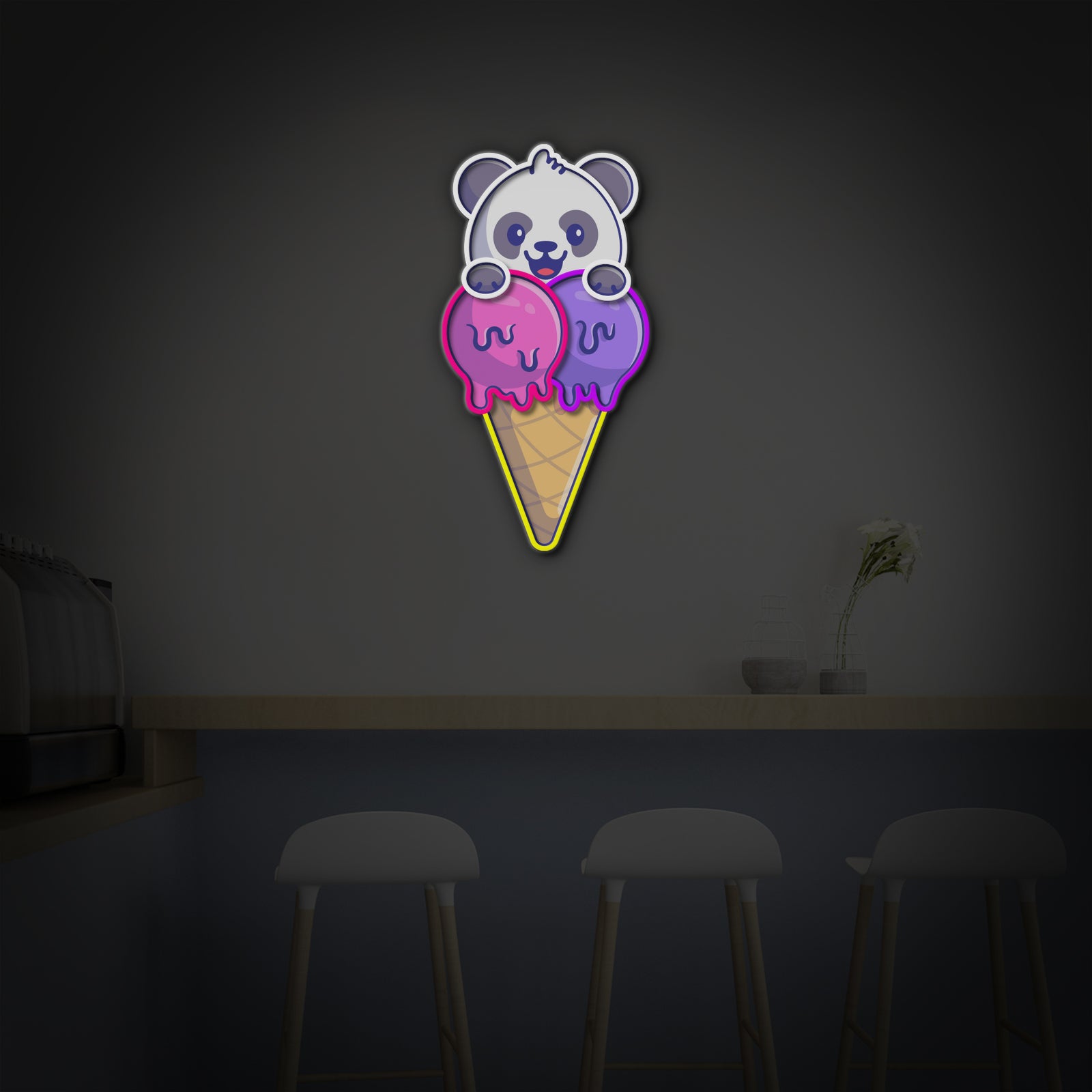 Close-up of Panda with Ice Cream neon sign details in low light.